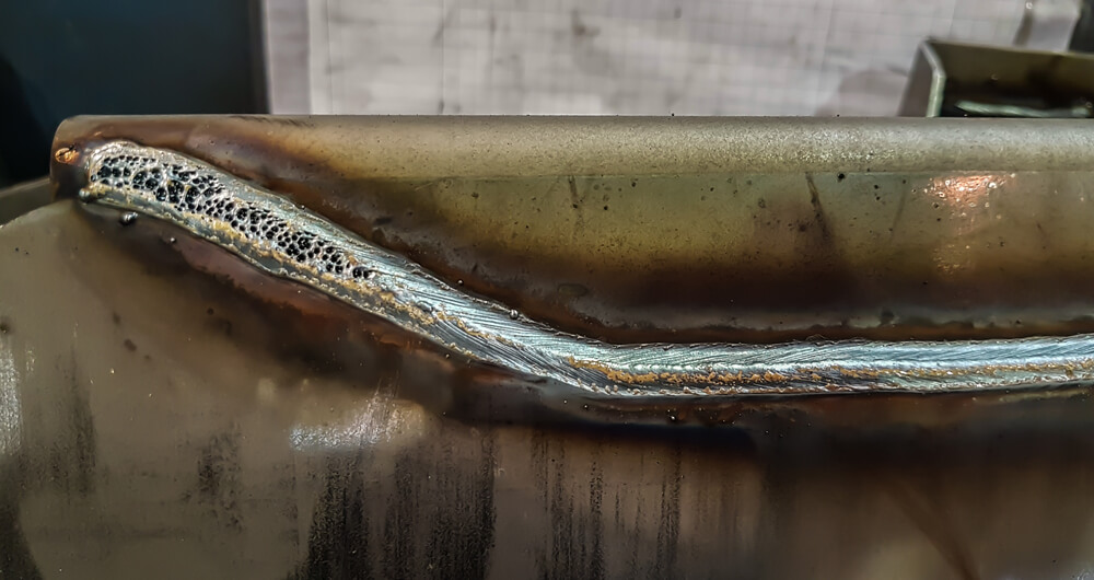 Picture of a bad weld with a seam separating